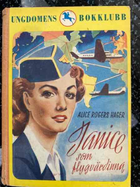 Janice som flyvärdinna