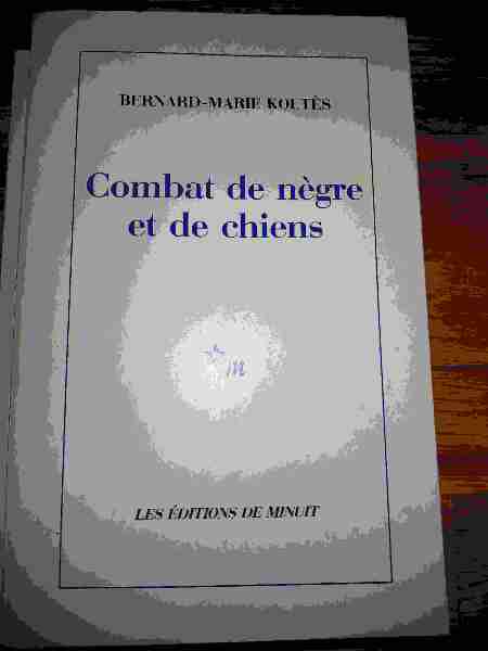 Combat de negre et de chien