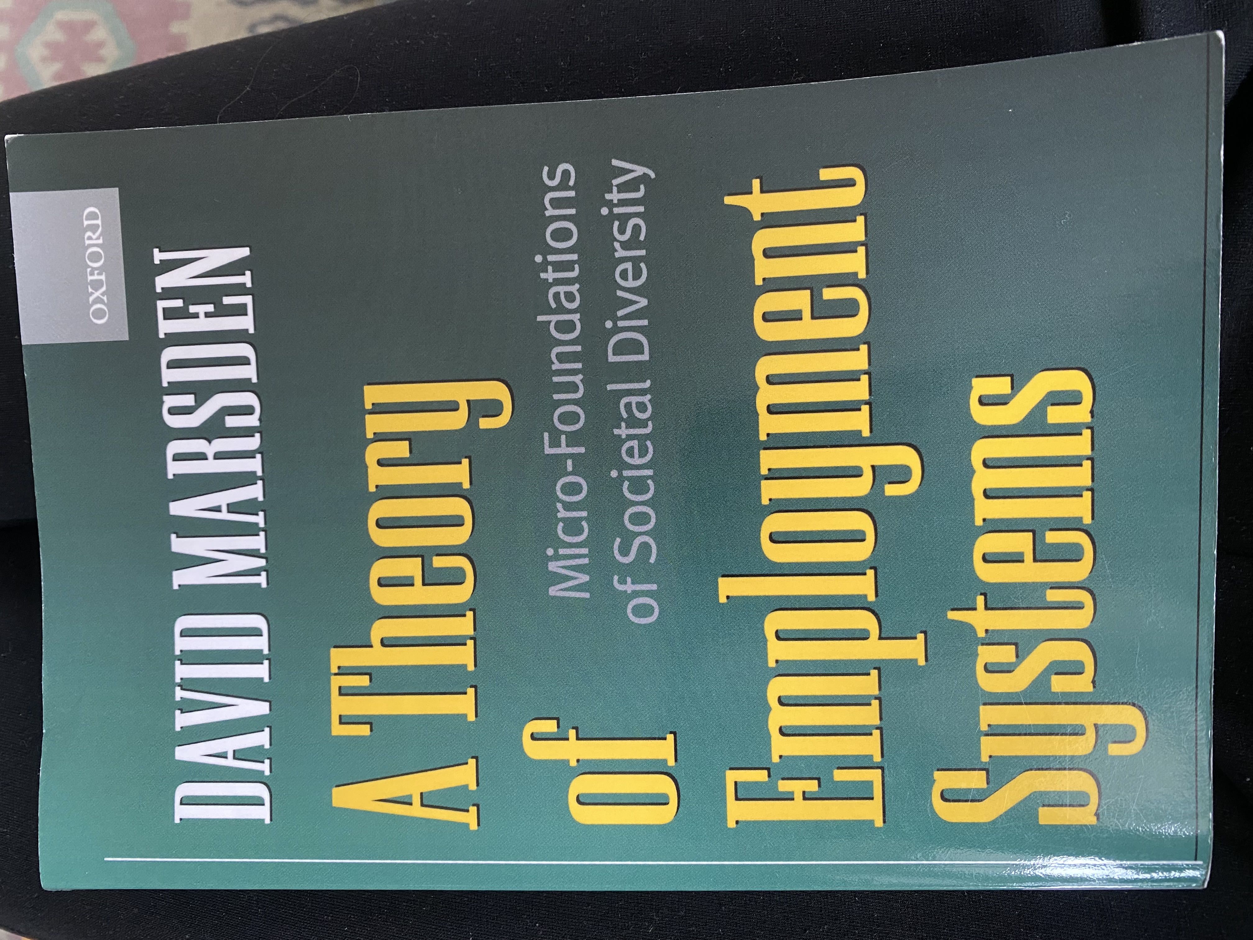 A theory of employment systems