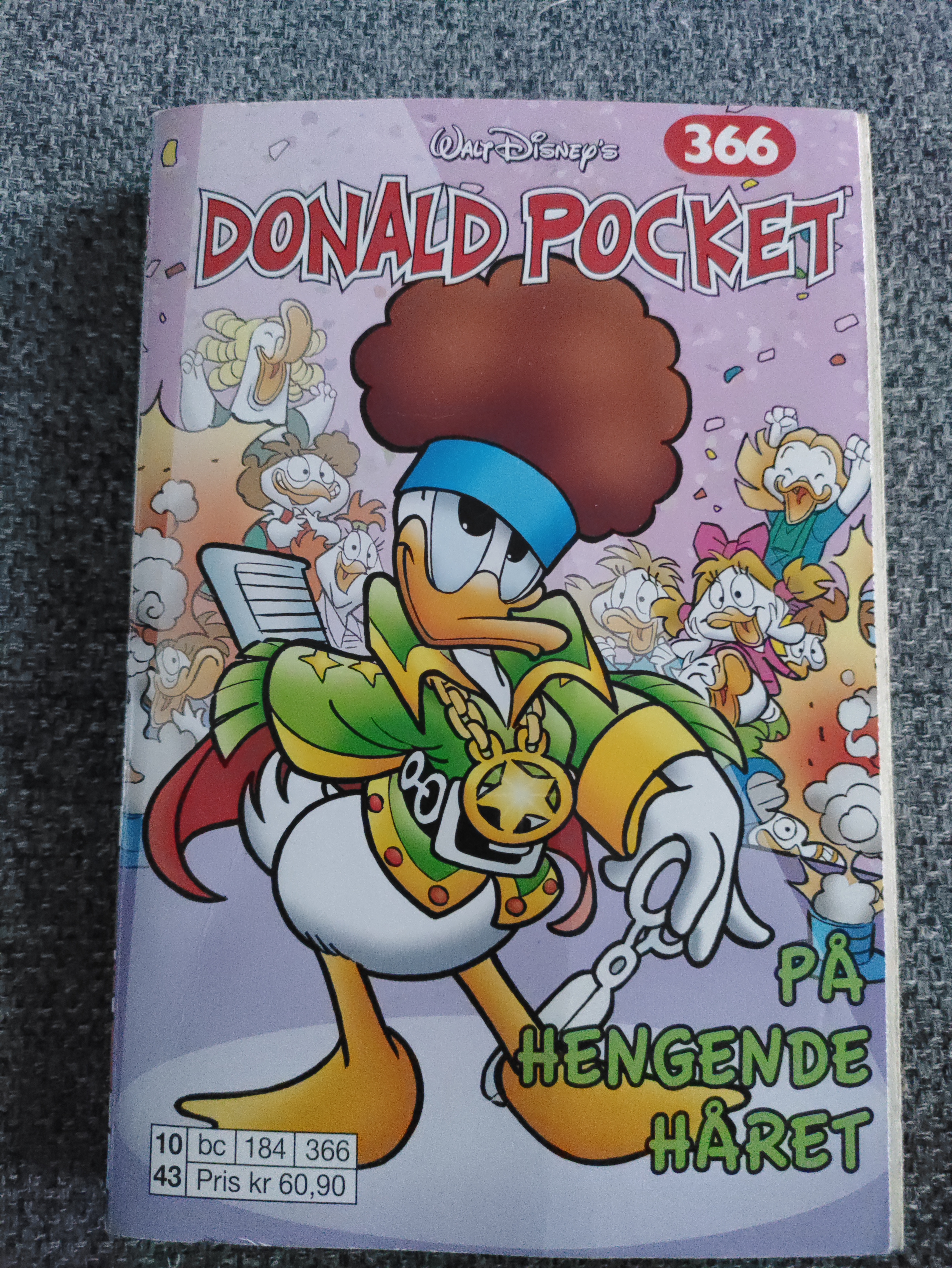 Donald pocket,på hengende håret 