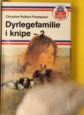 Dyrlegefamilie i knipe. 2