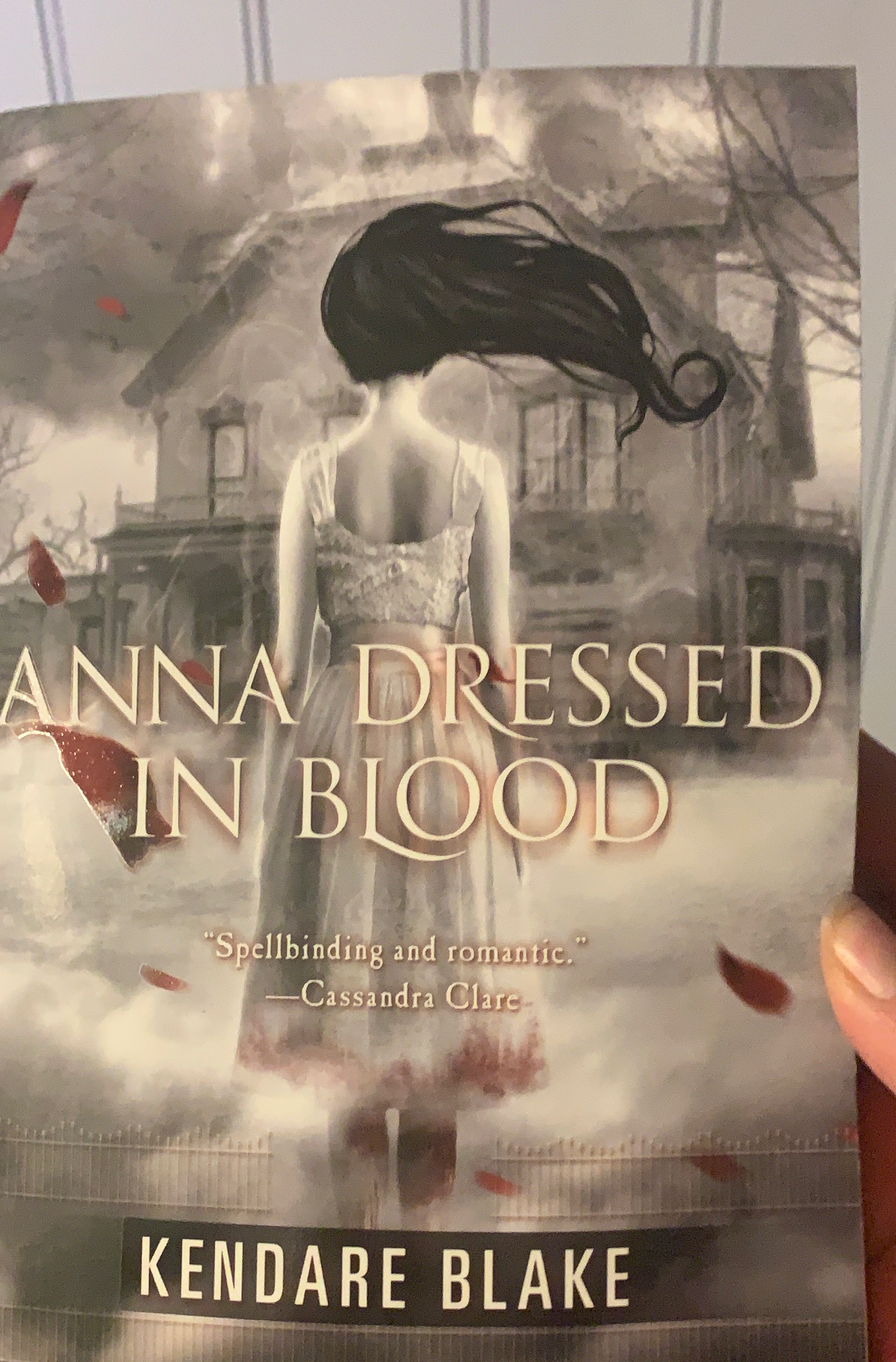 Anna dressed in blood